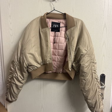 Bomber corto beige