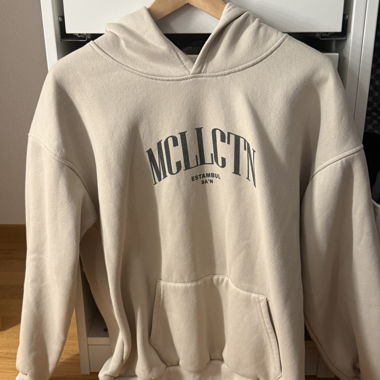 Felpa beige con stampa