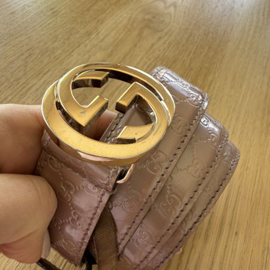 Light pink leather belt with gold buckle