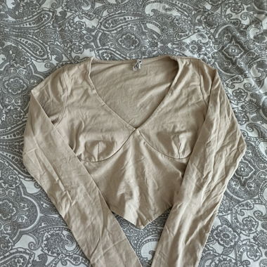 Top Subdued con Scollo a V