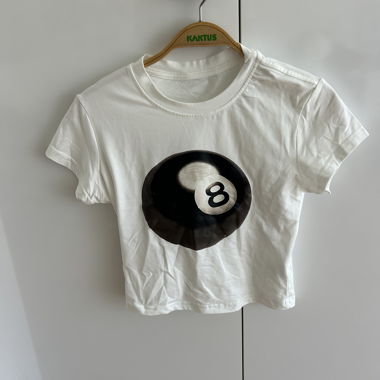 White top with bowling ball