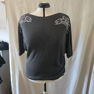 Maglione grigio a maniche corte