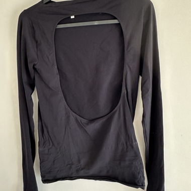 Black long-sleeve top with back cutout