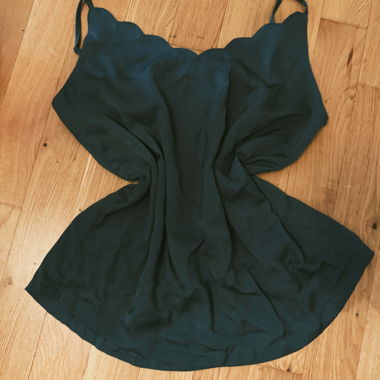 Black top with bottle-green straps