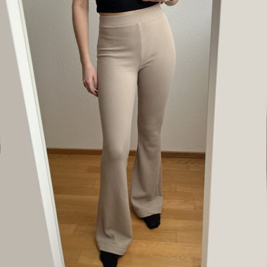 beige high rise flared pants