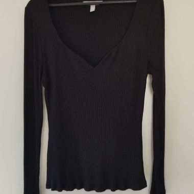 Top H&M nero a costine maniche lunghe