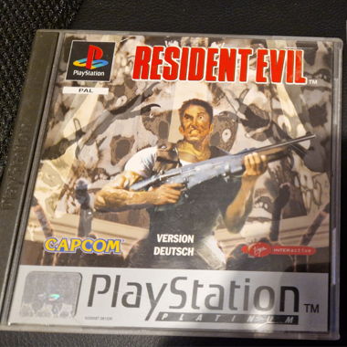 Ps1 2 games resident evil tombraider