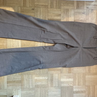 Pantaloni da completo con piega