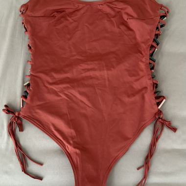 Sexy one-piece swimsuit with lace-up, rust colour