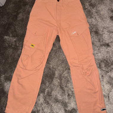Corteiz salmon trousers