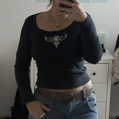 Black long sleeve top with white eagle 