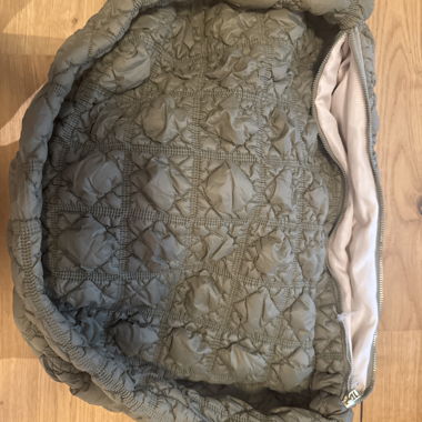 Gepolsterte grüne Tasche