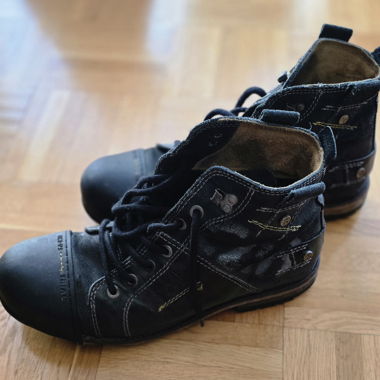Black high-top leather boots