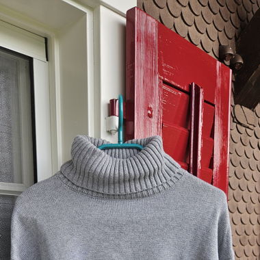 Grauer Rollkragen Pulli