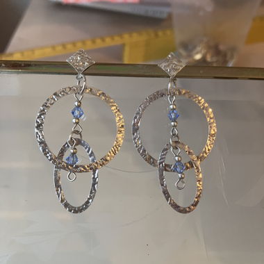 Silver earrings with blue pearls