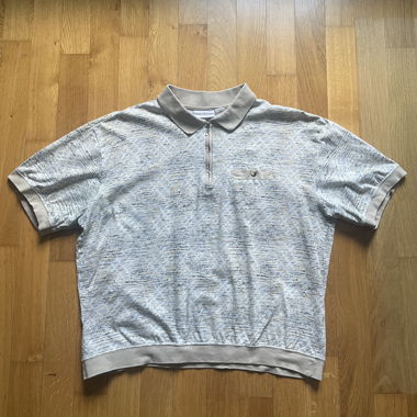 Polo con mezza zip