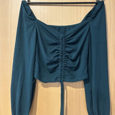 Top corto a costine color petrolio