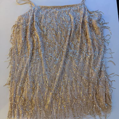 Abito H&M oro champagne con frange di paillettes