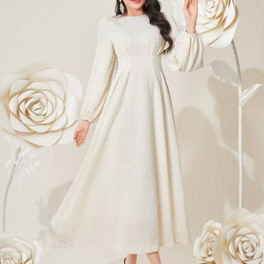 Kleid mit Lampionärmeln und Glitzer-effekt