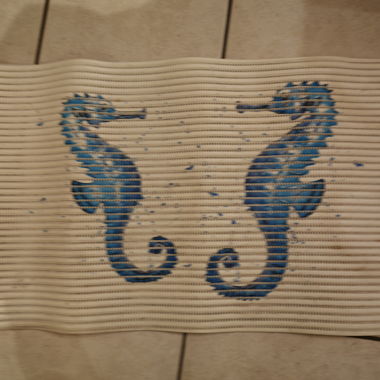 Bath mat with seahorses