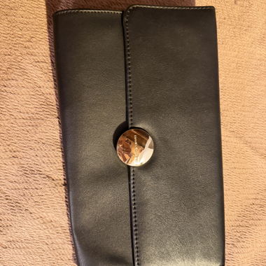 Black clutch with metal clasp