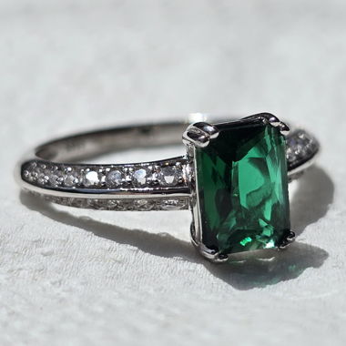 Silver ring with green stone