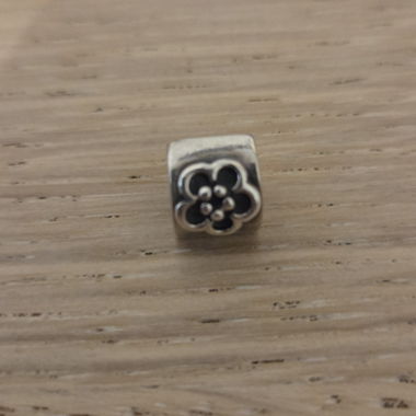 Flower charm in silver