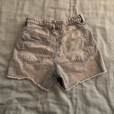 Short en jean à franges