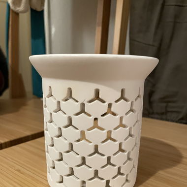 Cozy candle holder with place for essential oils