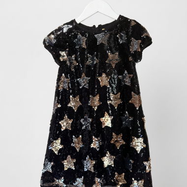 Abito nero con paillettes a stelle