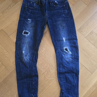 Zerrissene Jeans Blau