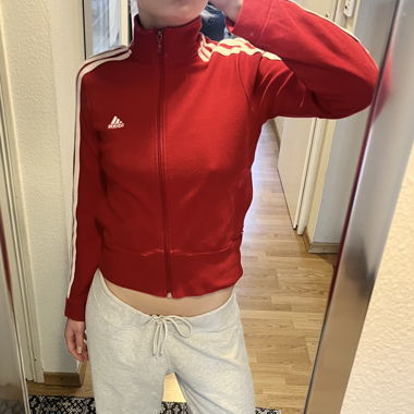 Veste d'entraînement adidas rouge avec fermeture éclair