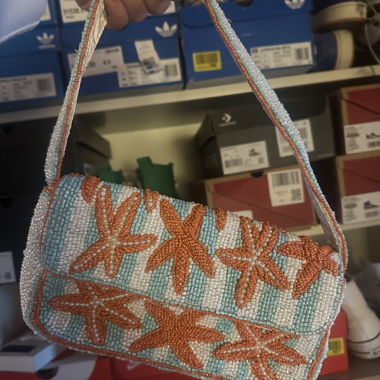Borsa a mano di perline con stella marina