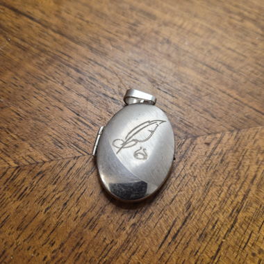 Medaglione ovale in argento per collana