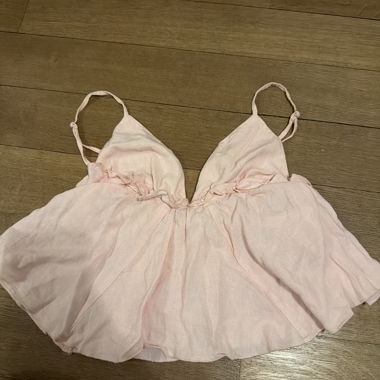 Haut rose clair atténué