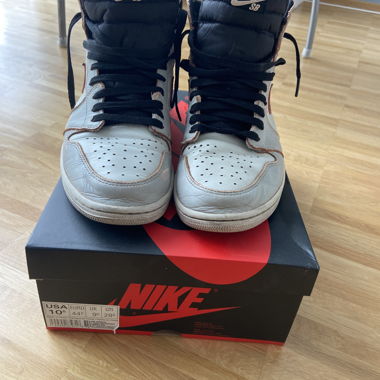 Nike Air Jordan 1 NYC verso Parigi