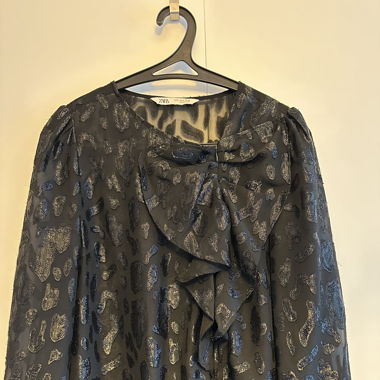 Black blouse with patterns