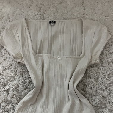 White Urban Outfitters top with bow detail