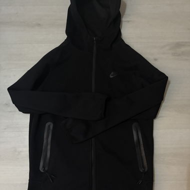 Authentic black Nike Tech jacket