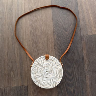 Runde, gewebte Crossbody-Tasche