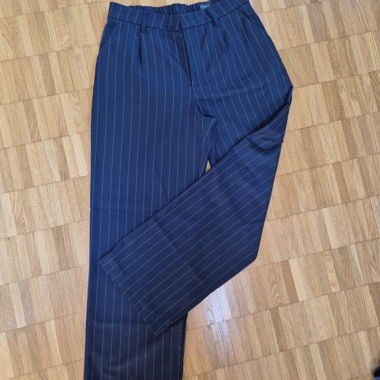 Pantaloni in tessuto rigato di H&M