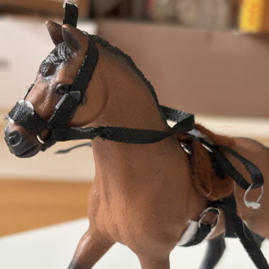 Sella a molle per cavalli Schleich