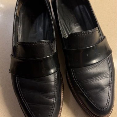 Black leather loafers