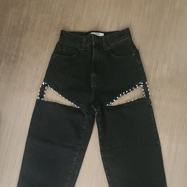 Jeans con ritagli