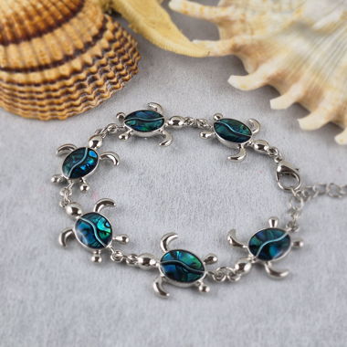 Bracelet plaqué or avec incrustation de nacre d’ormeau