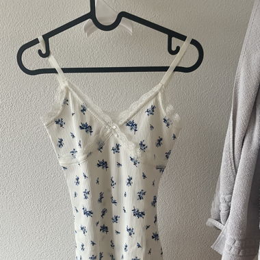 white dress with blue flowers
