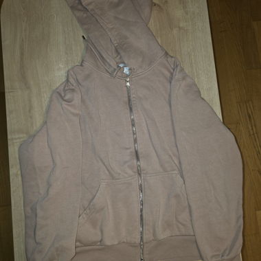 Gillet à capuche H&M couleur pêche.