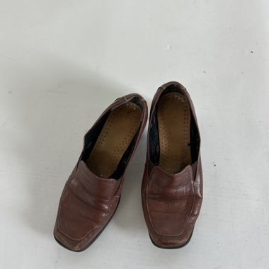 Mocassini in pelle marrone con tacco