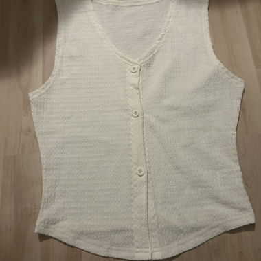 Top con bottoni senza maniche / Gilet