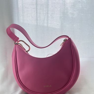 Pinke Schultertasche